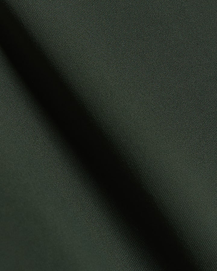 Green scoop back long sleeve bodysuit