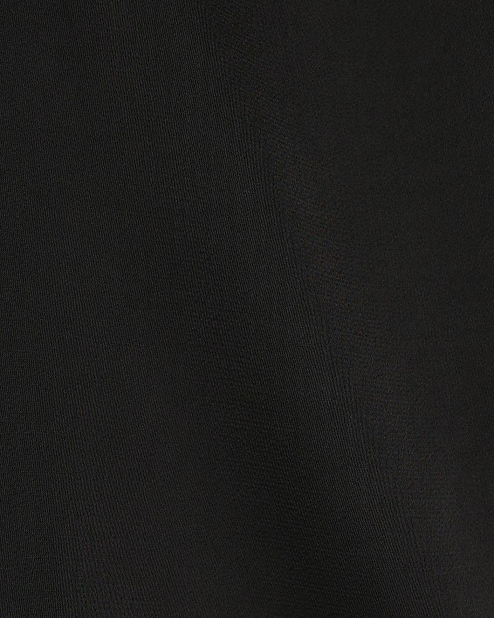 Black one shoulder cuffed blouse