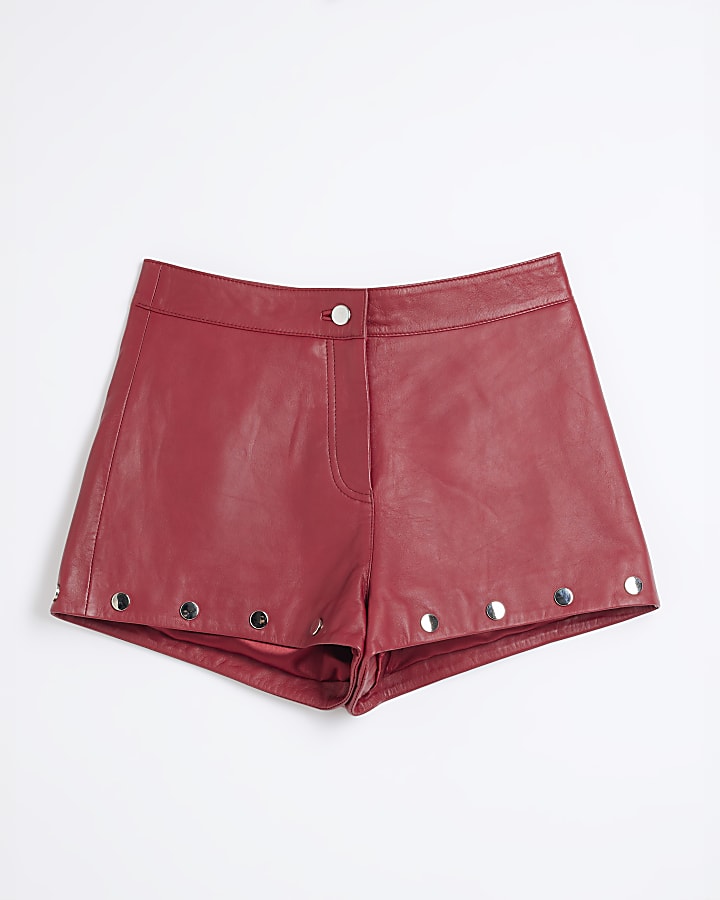 Red studded leather shorts