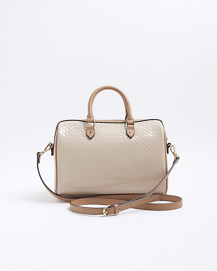 Beige embossed monogram bowler handbag