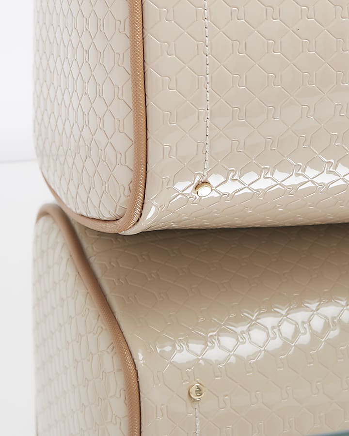 Beige embossed monogram bowler handbag