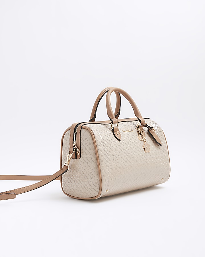 Beige embossed monogram bowler handbag