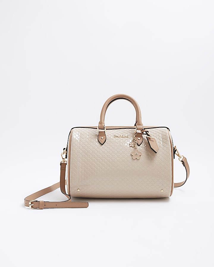 Beige embossed monogram bowler handbag