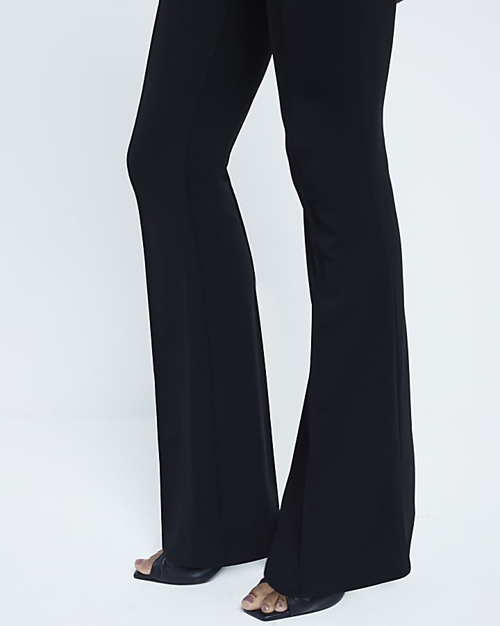 Black flared pull on trousers