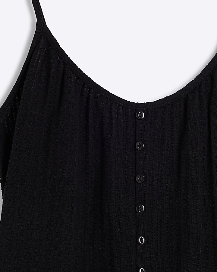 Black sleeveless button detail playsuit