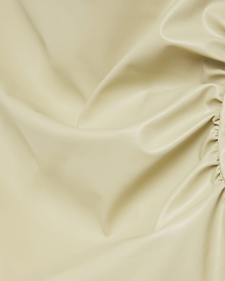 Beige faux leather drape top