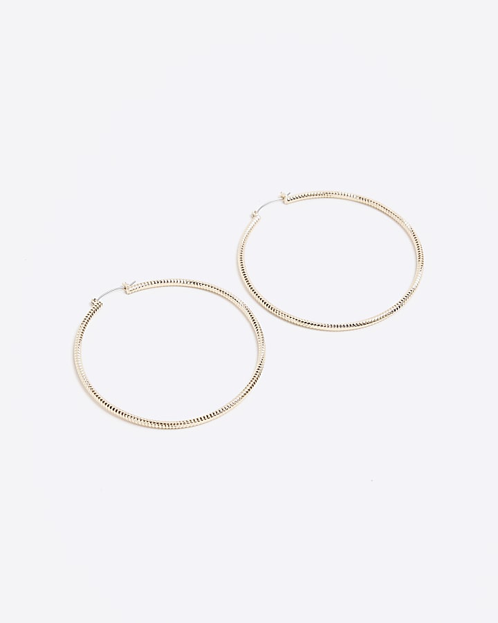 Gold textured large hoop earrings