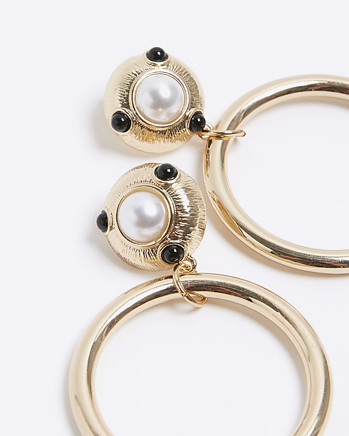 Gold open circle drop earrings