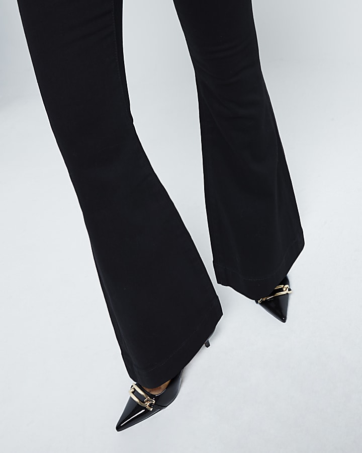 Petite black tummy hold flared jeans
