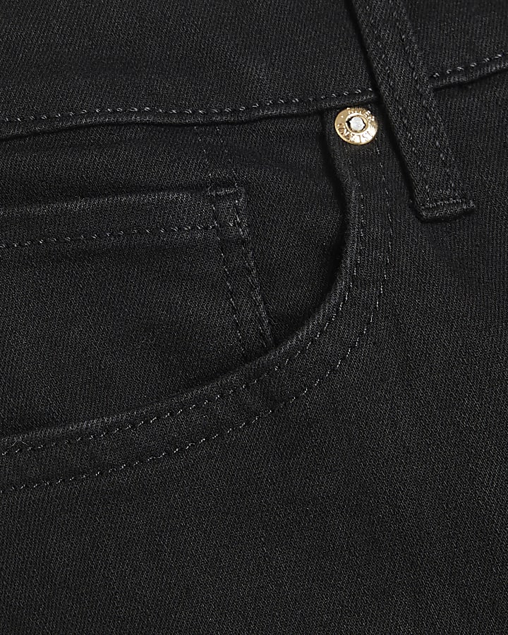 Petite black tummy hold flared jeans