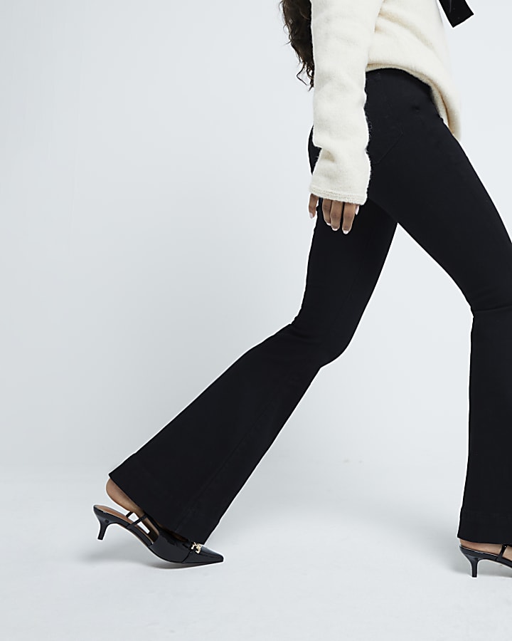 Petite black tummy hold flared jeans