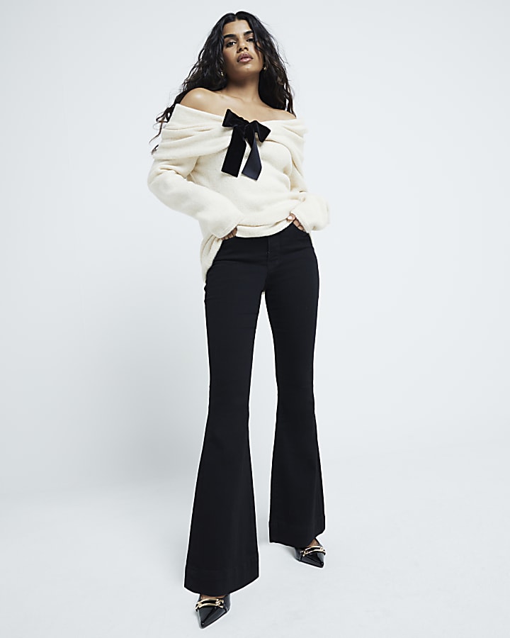 Petite black tummy hold flared jeans