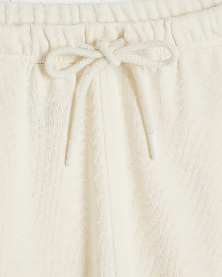 Cream Bootcut joggers