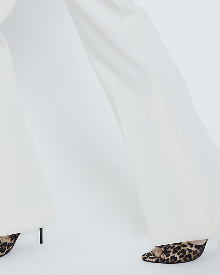 Cream side split soft flared trousers