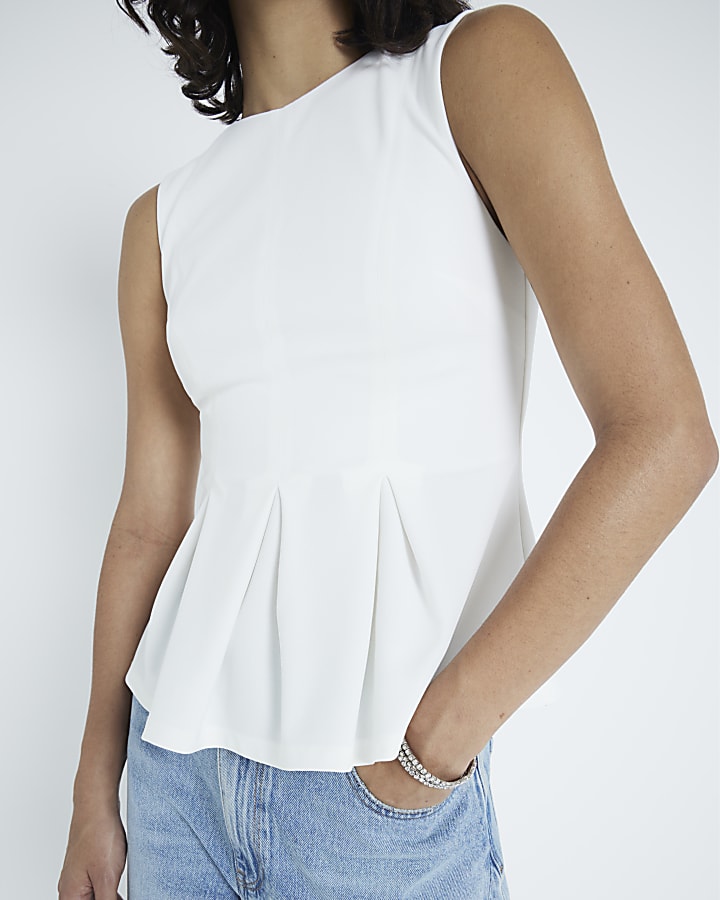 Cream Pleated Peplum Top