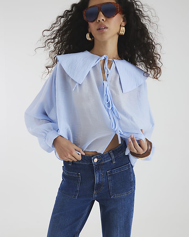 Blue High Rise Relaxed Flared Leg Jeans