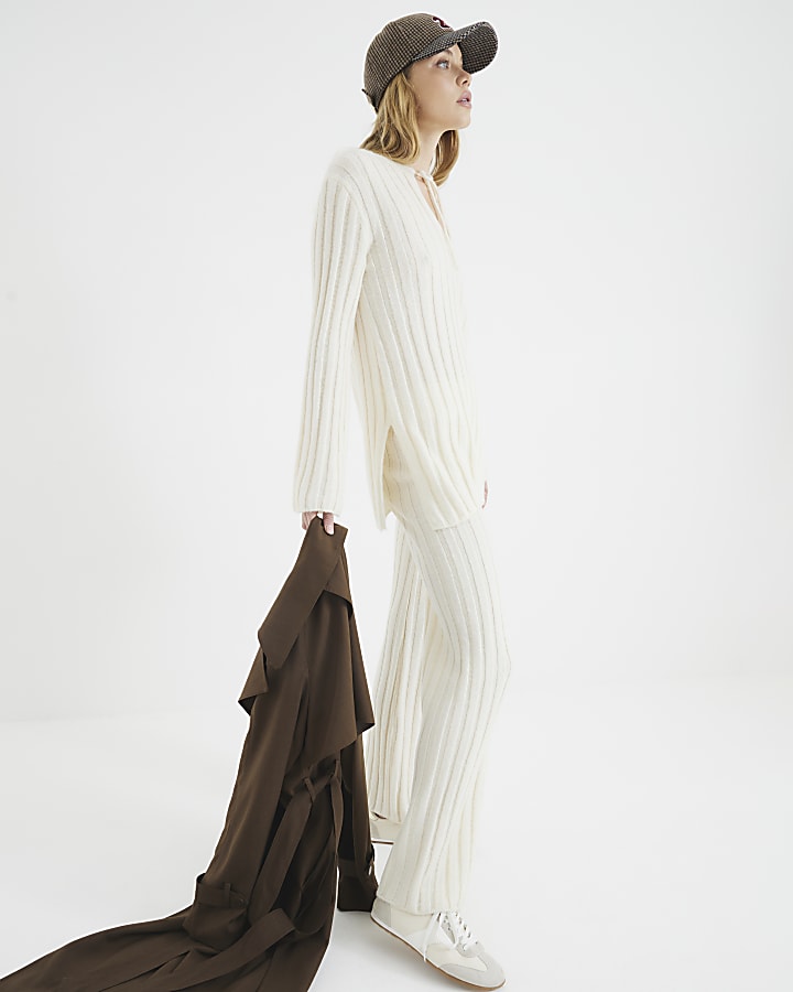 Cream Ribbed Flared Trousers