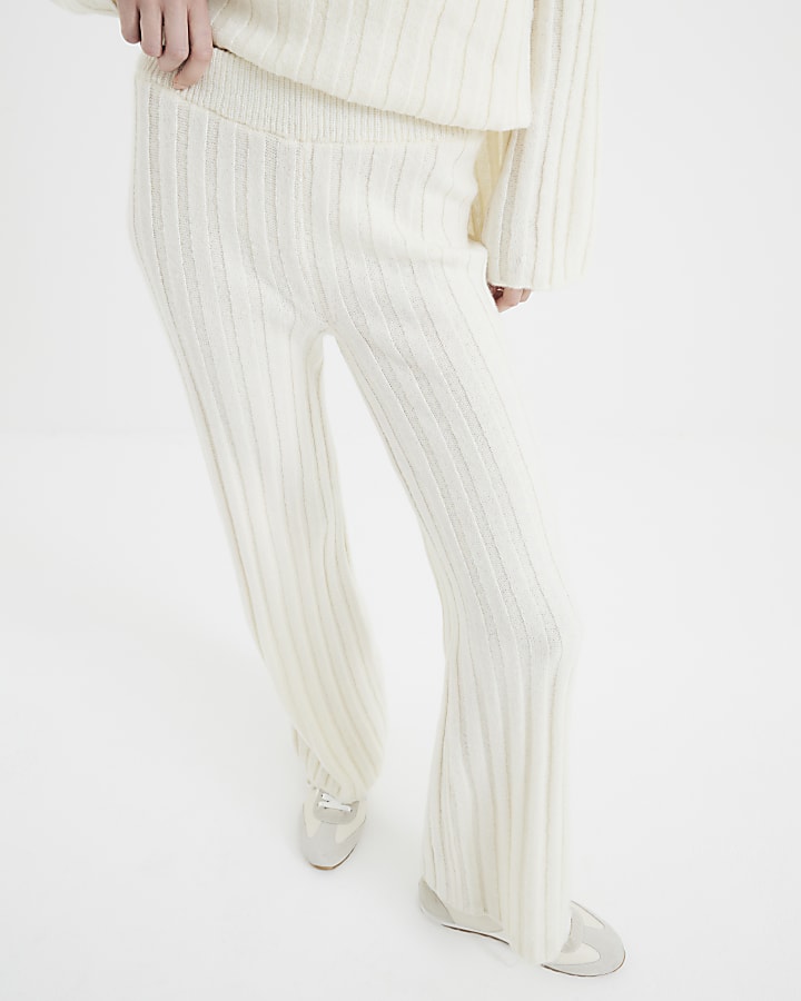 Cream Ribbed Flared Trousers