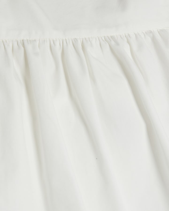 White Sleeveless Tie Back Peplum Cami Top