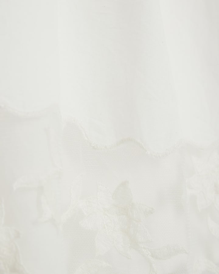Cream Sleeveless Lace Hem Cami Top