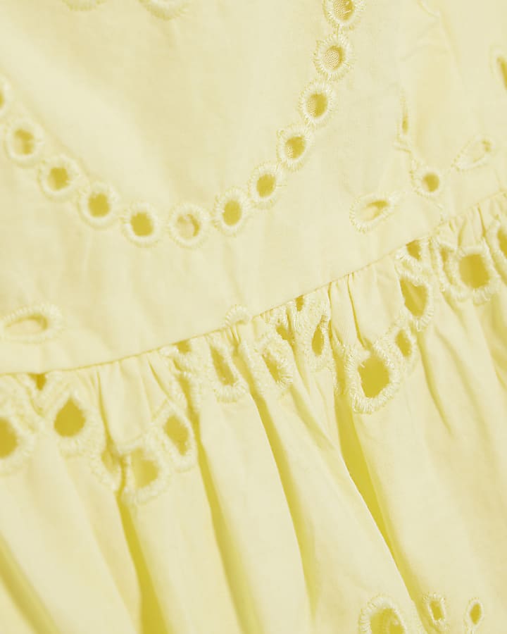 Yellow Sleeveless Cutwork Peplum Cami Top