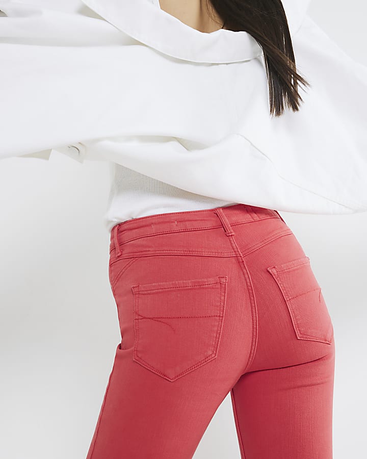 Red mid rise molly skinny Jeans