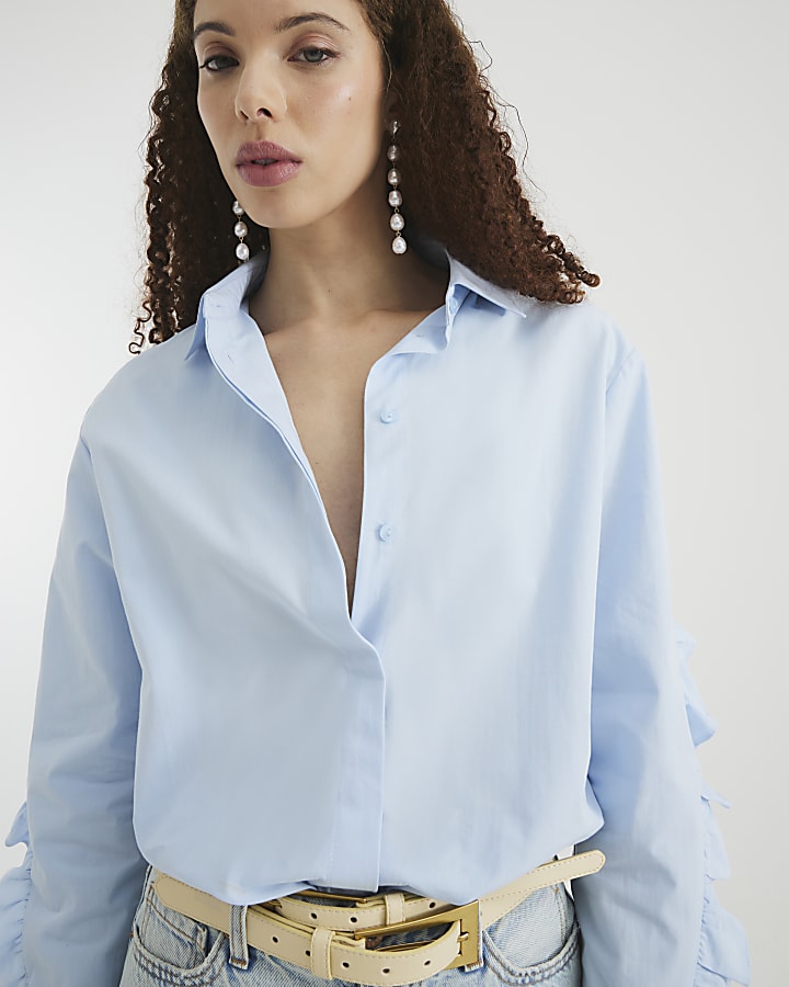 Blue Long Sleeve Ruffle Back Shirt