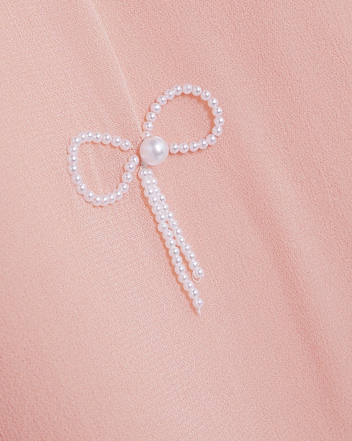 Pink Sleeveless Bow Embellished Top