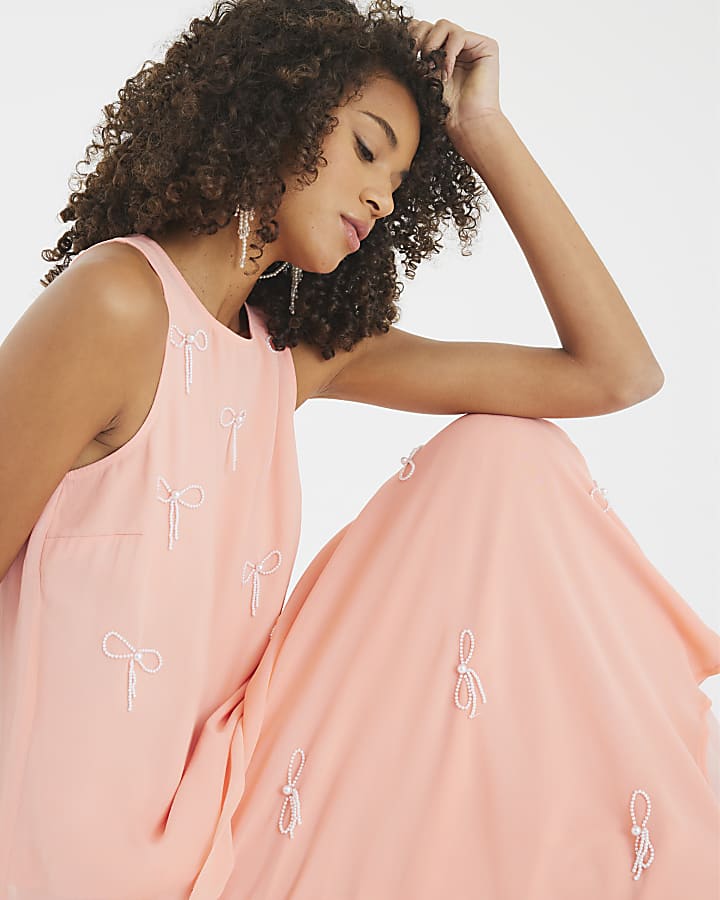 Pink Sleeveless Bow Embellished Top