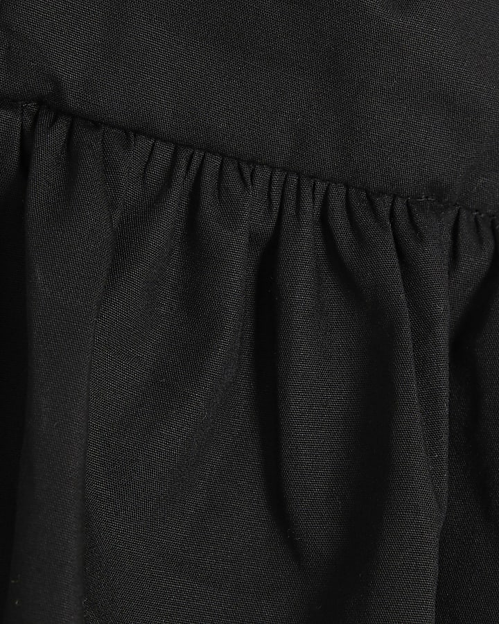 Black Sleeveless Tie Back Peplum Cami Top
