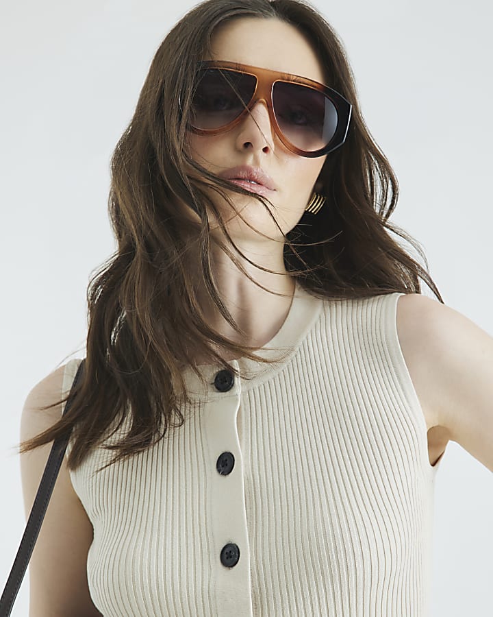 Cream Sleeveless Curved Hem Ribbed Top