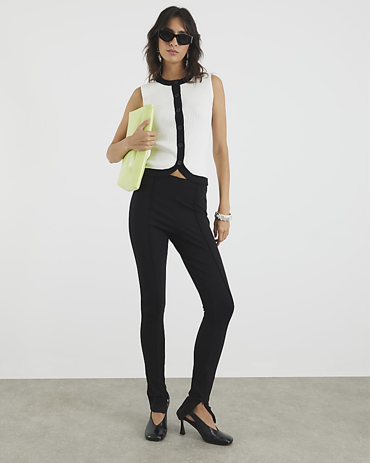 White Sleeveless Curved Hem Ribbed Top