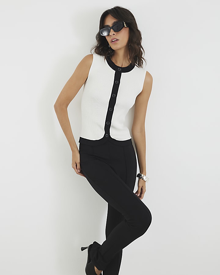 White Sleeveless Curved Hem Ribbed Top