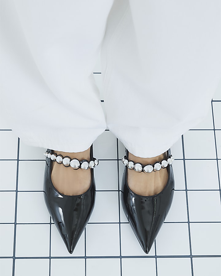 Black Strapped Sling Back Court Shoes