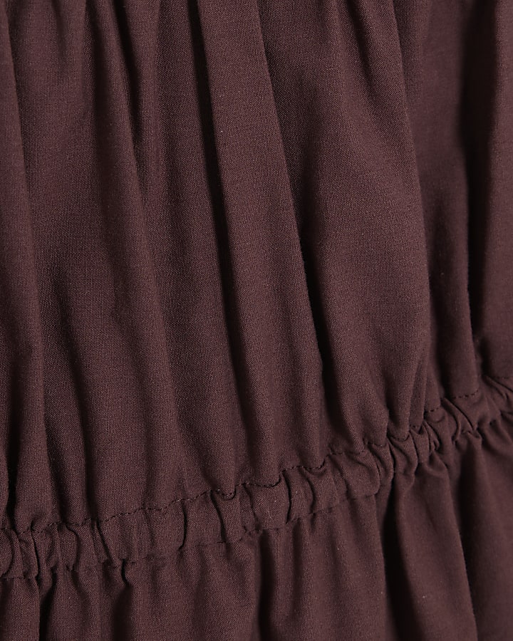 Purple Tiered String Detail Peplum Top