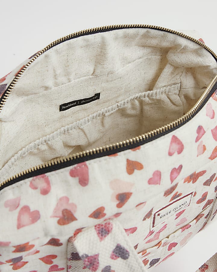 Cream Canvas Heart Print Holdall bag