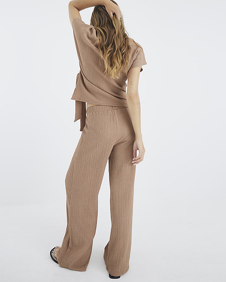 Beige Textured Wide Leg Trousers
