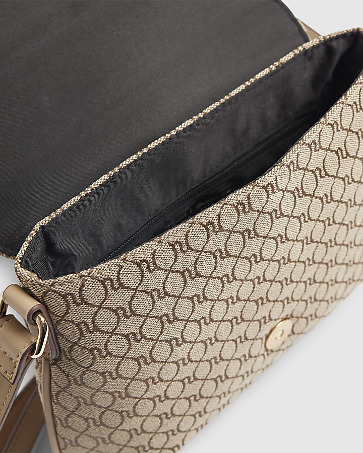Beige Monogram Snaffle Cross Body Saddle Bag