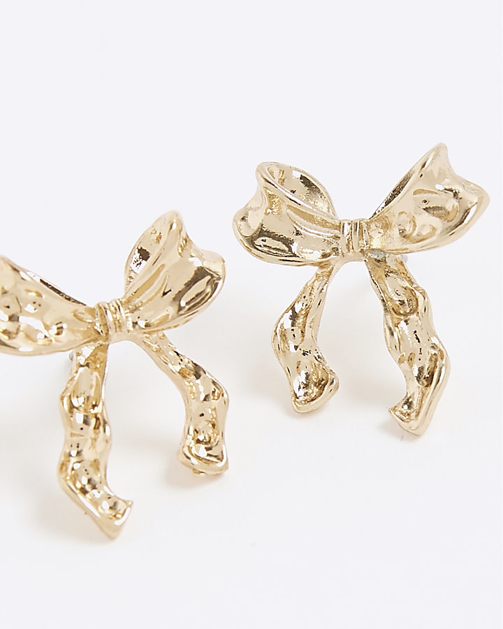 Gold bow stud earrings