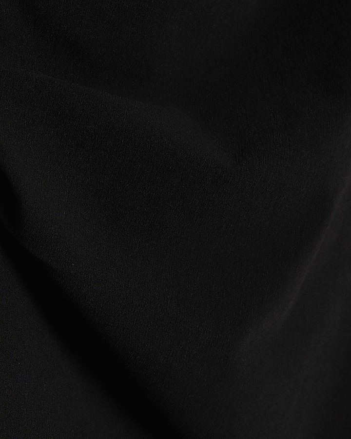 Black High Neck Asymmetric Peplum Top