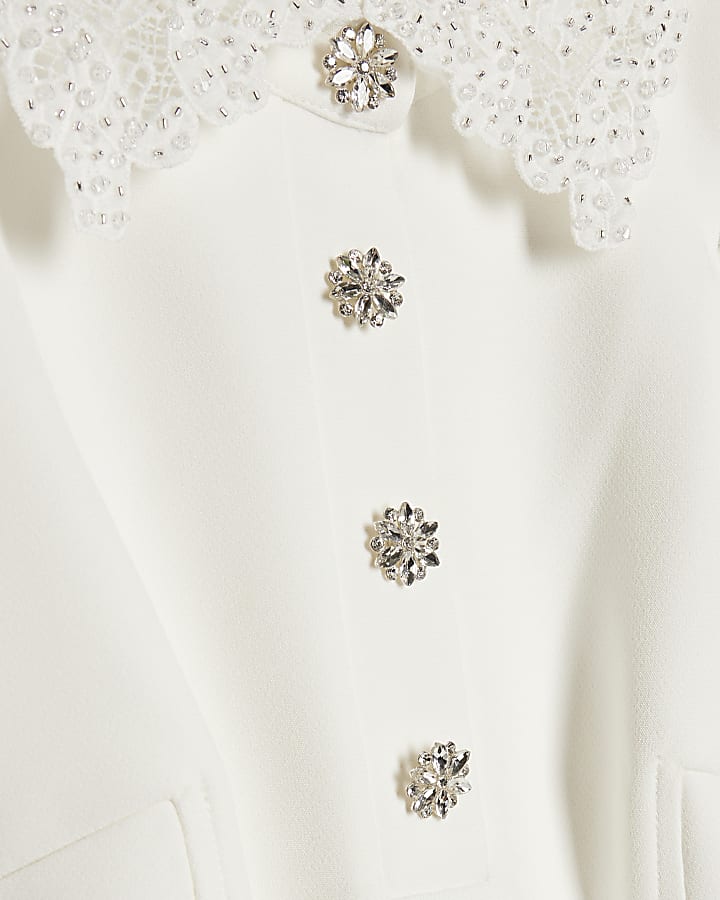 White Frill Sleeve Diamante Peplum Top