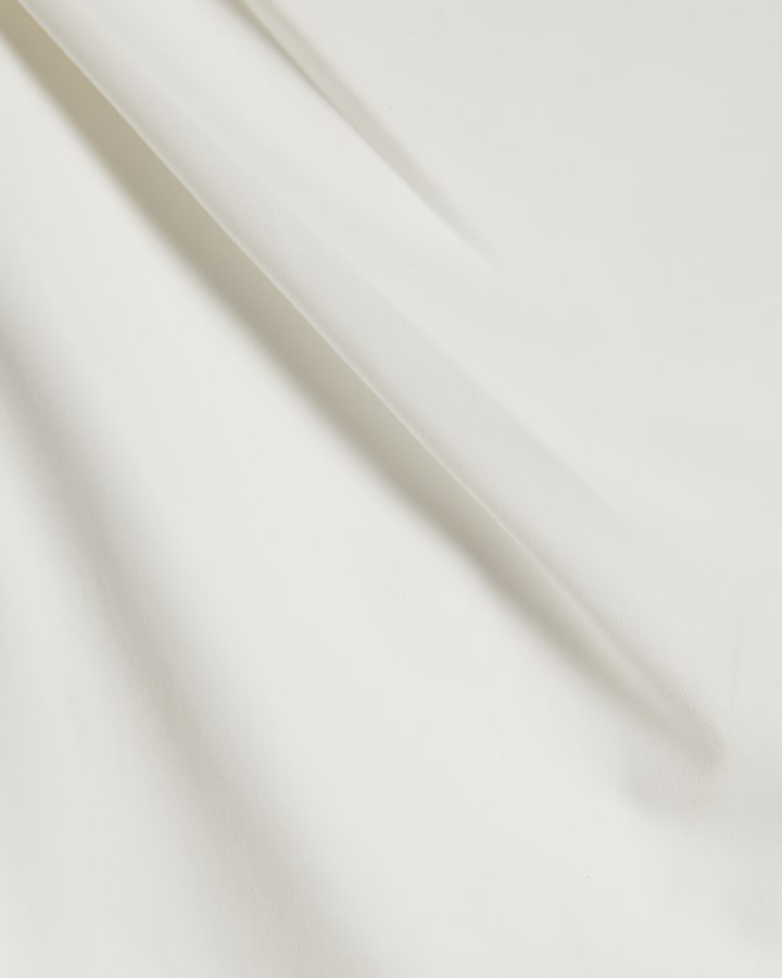 White Sleeveless Slash Neck Top