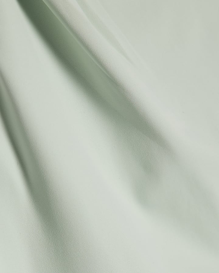 Green Sleeveless Slash Neck Top