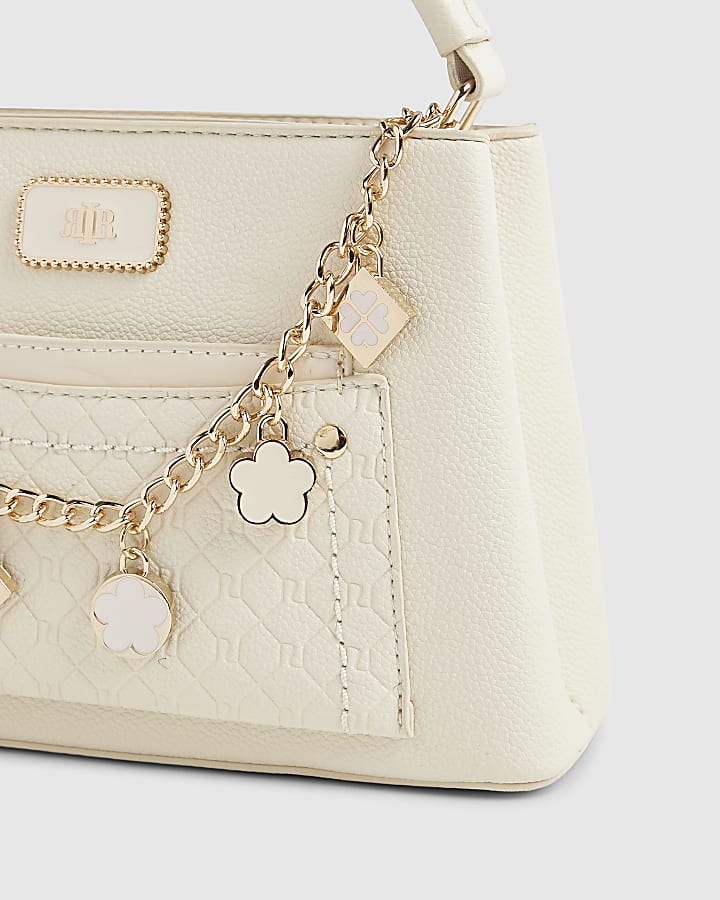 Cream Monogram Pocket Front Charmed Tote Bag