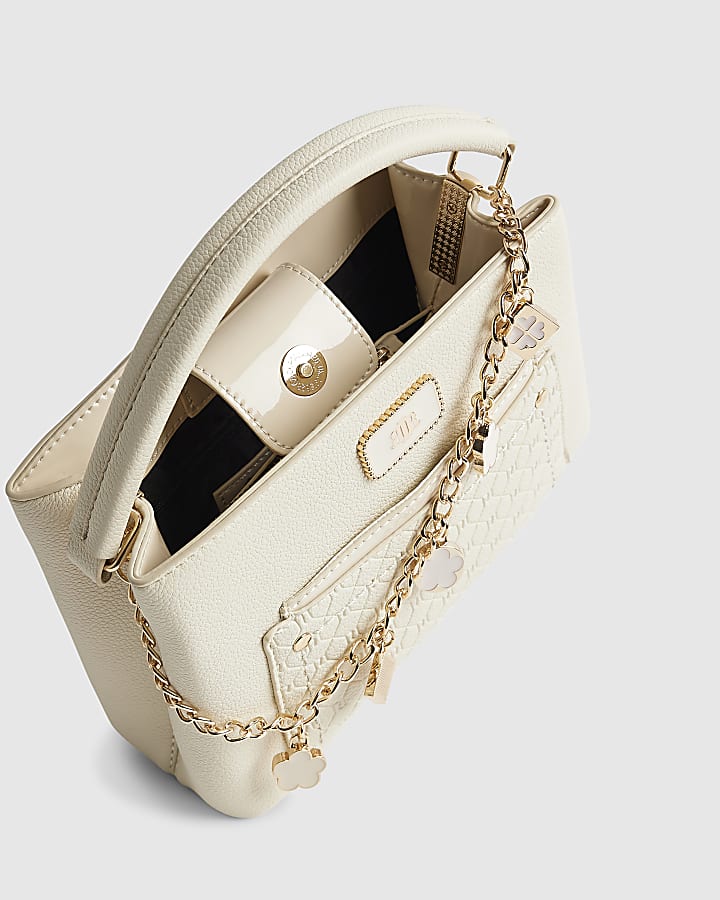 Cream Monogram Pocket Front Charmed Tote Bag