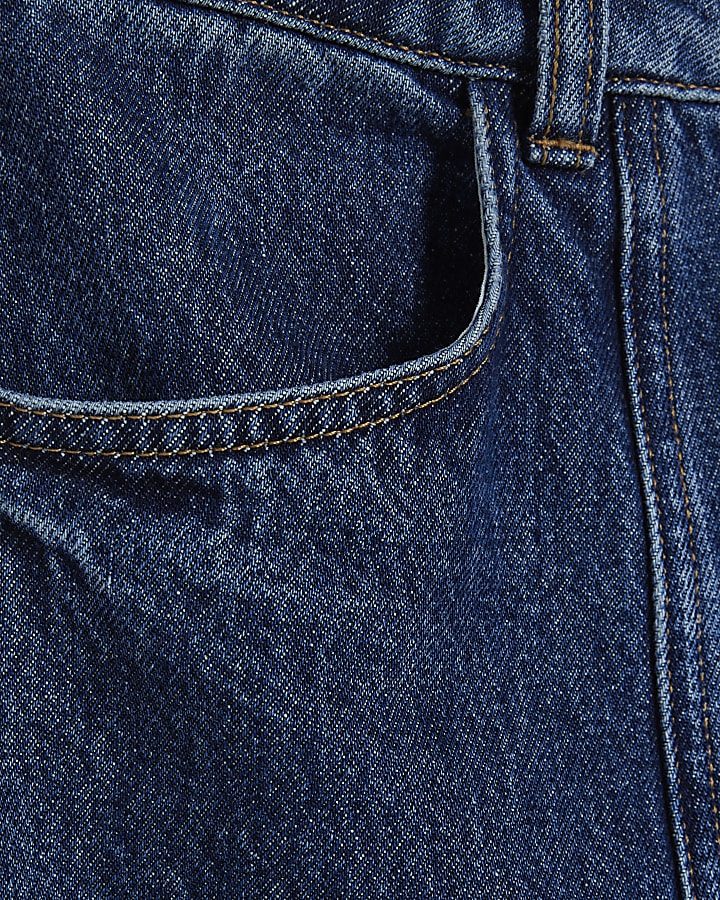 Blue Mid Rise Seamed Raw Hem Barrel Jeans