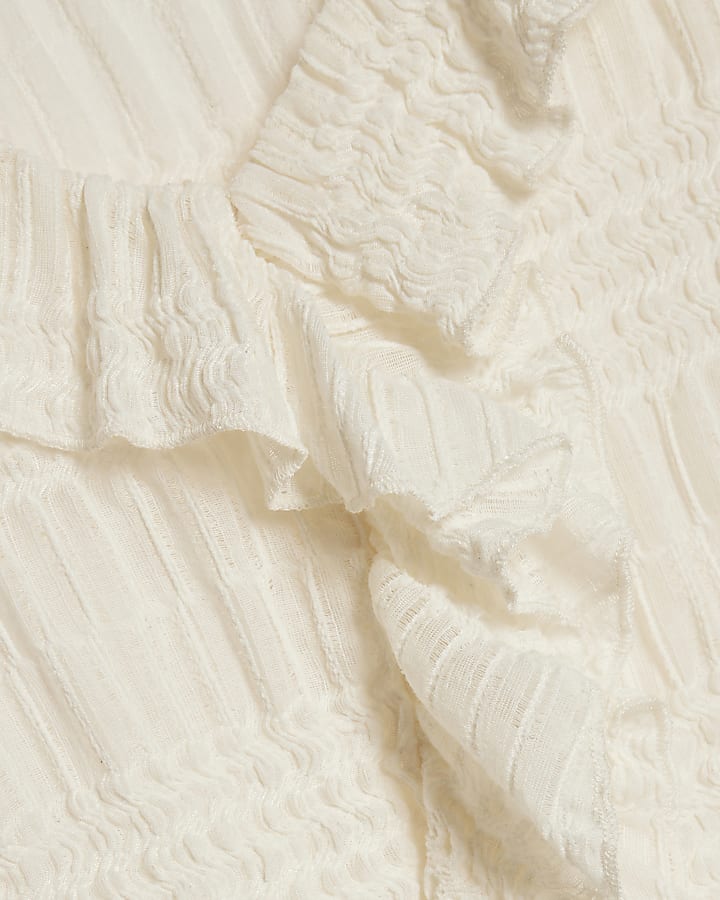 Cream Long Sleeve Ruffle Peplum Top