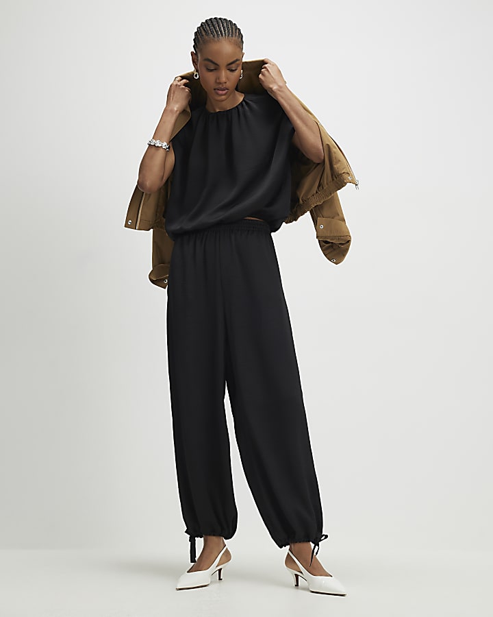 Black Sleeveless Bubble Hem Top