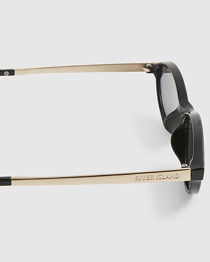 Black Slim Oval Gold Temple Sunglasses