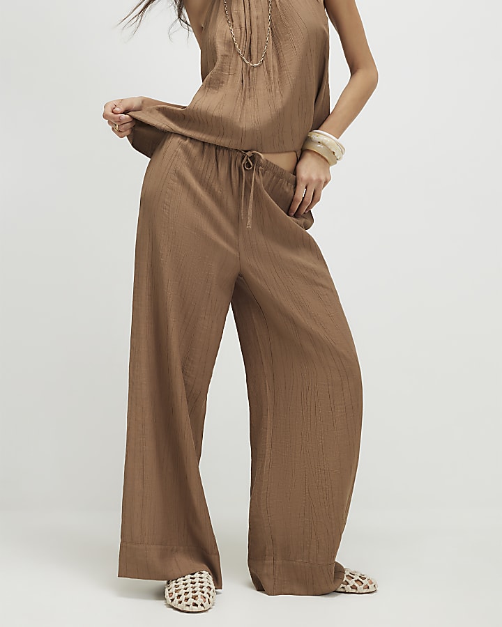 Beige Textured Wide Leg Trousers